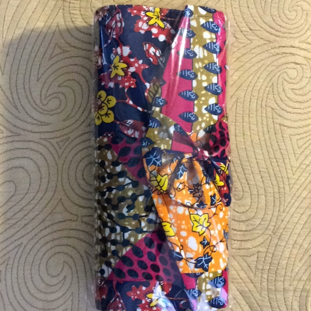 New Authentic African pink & orang clutch w/ bow